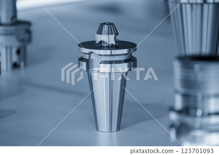 The CNC cutter holder in the light blue scene. 123701093