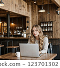 young woman working in a cafe 123701302
