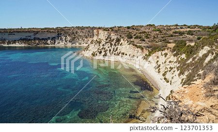 Tourism thrives along sunny Malta coast, tourism showcasing clear waters and rugged cliffs, tourism beckoning global explorers to discover vibrant cultural heritage Tourism thrives along sunny Malta coast, tourism showcasing clear waters and rugged cliffs, tourism beckoning global explorers to discover vibrant cultural heritage 123701353