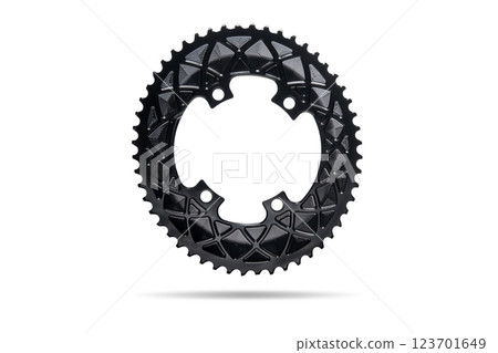 Black oval bicycle chainring against white isolated background, floating above the surface. Professional bicycle part. 123701649
