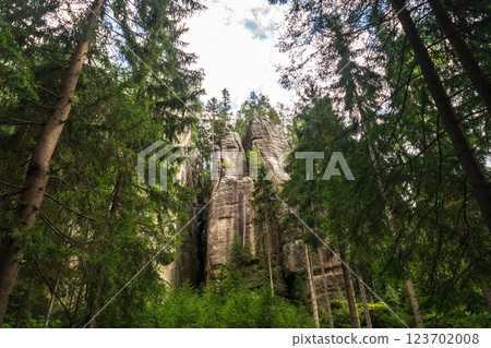 Majestic sandstone cliffs surrounded by lush greenery and forests for tourism, ecotourism 123702008