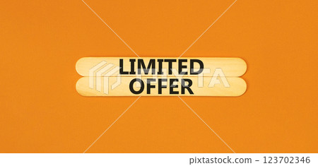 Limited offer symbol. Concept words Limited offer on wooden stick. Beautiful orange table orange background. Business marketing, motivational Limited offer concept. Copy space. Limited offer symbol. Concept words Limited offer on wooden stick. Beautiful orange table orange background. Business marketing, motivational Limited offer concept. Copy space. 123702346