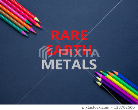 Rare earth metals symbol. Concept words Rare earth metals on beautiful black paper. Colored pencils. Beautiful black background. Business and rare earth metals concept. Copy space. 123702500