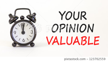 Your opinion valuable symbol. Concept words Your opinion valuable on beautiful white paper. Beautiful white background. Black alarm clock. Business your opinion valuable concept. Copy space. Your opinion valuable symbol. Concept words Your opinion valuable on beautiful white paper. Beautiful white background. Black alarm clock. Business your opinion valuable concept. Copy space. 123702559