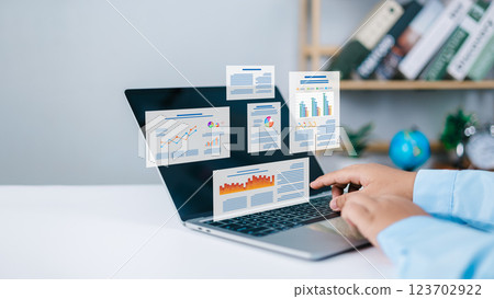 Business data analysis, Businessman using laptop performance indicator dashboard, Economic and business growth chart analysis, Business development leading to success, Market and strategic planning. 123702922