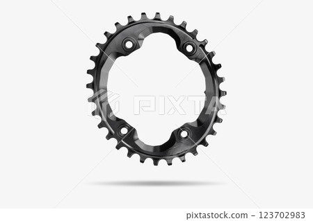 Black oval bicycle chainring against white isolated background, floating above the surface. Professional bicycle part. 123702983