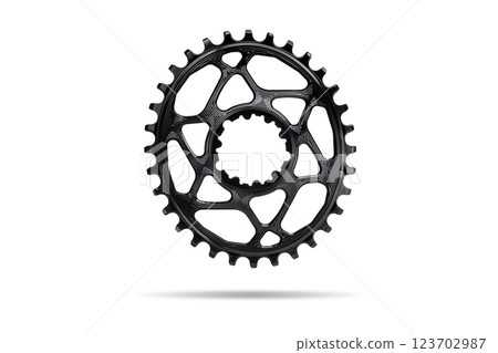 Black oval bicycle chainring against white isolated background, floating above the surface. Professional bicycle part. 123702987