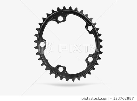 Black oval bicycle chainring against white isolated background, floating above the surface. Professional bicycle part. 123702997
