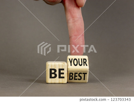 Motivational be your best symbol. Concept words Be your best on beautiful wooden block. Beautiful grey background Businessman hand. Business motivational be your best concept. Copy space. 123703343