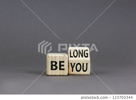 Belonging and belong symbol. Concept words Be you Belong on beautiful wooden block. Beautiful grey table grey background. Business motivational belonging and belong concept. Copy space. Belonging and belong symbol. Concept words Be you Belong on beautiful wooden block. Beautiful grey table grey background. Business motivational belonging and belong concept. Copy space. 123703344