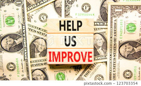 Help us improve symbol. Concept words Help us improve on beautiful wooden blocks. Dollar bills. Beautiful background from dollar bills. Business motivational help us improve concept. Copy space. 123703354