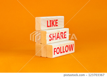 Like share follow symbol. Concept words Like Share Follow on beautiful wooden blocks. Beautiful orange table orange background. Business like share follow concept. Copy space. Like share follow symbol. Concept words Like Share Follow on beautiful wooden blocks. Beautiful orange table orange background. Business like share follow concept. Copy space. 123703367