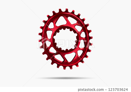 Red oval bicycle chainring against white isolated background, floating above the surface. Professional bicycle part. 123703624