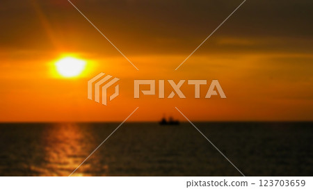 Creative evening seascape with blur and bokeh effect. Nature theme for design as background. Creative evening seascape with blur and bokeh effect. Nature theme for design as background. 123703659