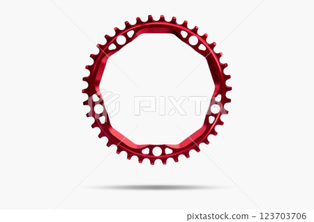 Red round bicycle chainring against white isolated background, floating above the surface. Professional bicycle part. 123703706