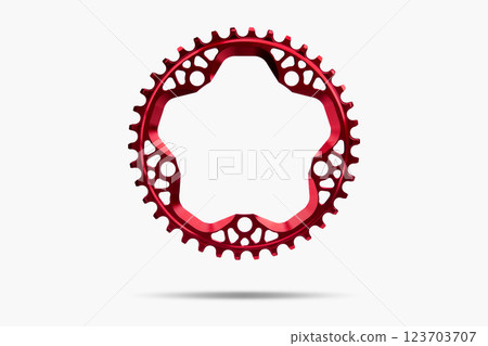 Red round bicycle chainring against white isolated background, floating above the surface. Professional bicycle part. Red round bicycle chainring against white isolated background, floating above the surface. Professional bicycle part. 123703707