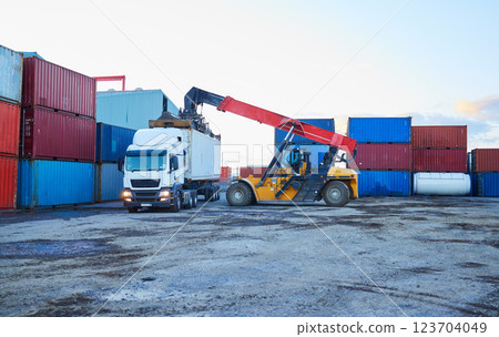 Logistics, shipping and container with truck and forklift in cargo warehouse for supply chain, delivery and export industry. Economy, ecommerce and global in factory port with transportation 123704049