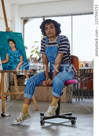 Art, creative and paint with a woman artist or painter sitting in her studio next to a masterpiece on a canvas. Painting, artistic and creativity with a female design professional in her workshop Art, creative and paint with a woman artist or painter sitting in her studio next to a masterpiece on a canvas. Painting, artistic and creativity with a female design professional in her workshop 123704151