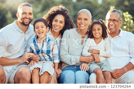 Big family portrait in a park with grandparents and children for summer, outdoor holiday and wellness. Happy grandmother, grandfather with mom, dad and kids in nature, bonding and bokeh lens flare Big family portrait in a park with grandparents and children for summer, outdoor holiday and wellness. Happy grandmother, grandfather with mom, dad and kids in nature, bonding and bokeh lens flare 123704264