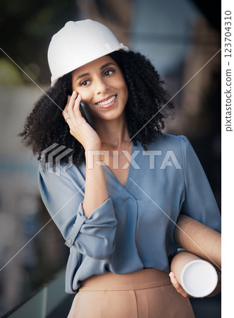 Architect, phone call and black woman talking on smartphone, holding blueprint with smile outside construction, architecture and engineering industry. Happy african female worker talking to contact 123704310