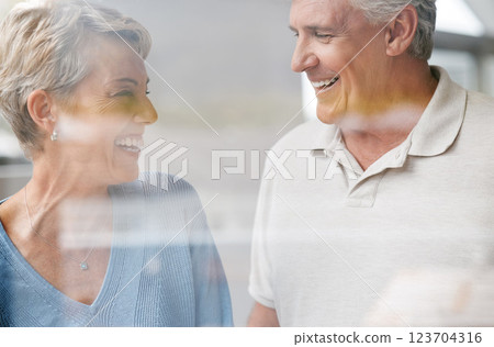 Senior, couple and happy love of woman and a man laughing together in retirement. Elderly people enjoy a funny conversation with happiness, joy and life gratitude smile in a house speaking 123704316