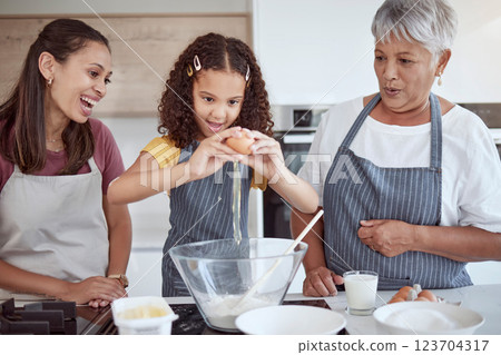 Happy family, child and grandmother cooking in kitchen with flour and egg food learning to make a cake or cookies with women support, love and care. Mexico kid in home baking together for mothers day 123704317