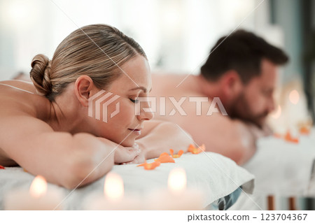 Relax, spa and couple on massage bed table for luxury messaging, zen and calm on vacation in hotel resort. Health, body wellness therapy or body care treatment of man and woman on holiday together Relax, spa and couple on massage bed table for luxury messaging, zen and calm on vacation in hotel resort. Health, body wellness therapy or body care treatment of man and woman on holiday together 123704367