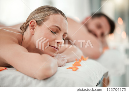 Woman, bed and spa for luxury massage to relax, breathe and zen on vacation, holiday or hotel with man. Couple, healing and health of body at wellness, care and physical therapy salon together Woman, bed and spa for luxury massage to relax, breathe and zen on vacation, holiday or hotel with man. Couple, healing and health of body at wellness, care and physical therapy salon together 123704375