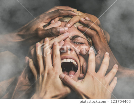 Hands, face and woman abuse victim with fear, mental health and pain scared with smoke. Crying, angry and violence survivor screaming in studio with dark background with stress, alone and anxiety. Hands, face and woman abuse victim with fear, mental health and pain scared with smoke. Crying, angry and violence survivor screaming in studio with dark background with stress, alone and anxiety. 123704403