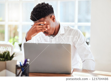 Burnout, headache and stress finance manager feeling sick, tired and anxiety about a financial problem at his startup company. Tired and frustrated professional businessman working at an office 123704486