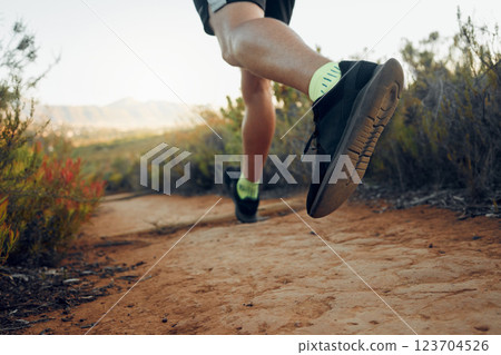 Fitness, shoes and runner in sports motivation for health exercise, workout and trekking in the nature outdoors. Shoe of active athlete in mountain running for healthy wellness and sport training Fitness, shoes and runner in sports motivation for health exercise, workout and trekking in the nature outdoors. Shoe of active athlete in mountain running for healthy wellness and sport training 123704526