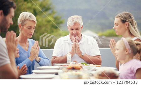 Big family food, praying thanks and prayer for lunch, dinner table and worship, gratitude and respect in Australia. Kids, parents and grandparents trust god, faith and religion before eating together 123704538