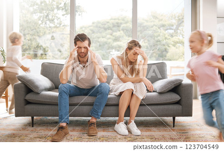 Noise, headache and stress with children and parents in a living room, overwhelmed by adhd kids energy. Burnout, anxiety and family in crisis, suffering from behaviour problem and fatigue 123704549