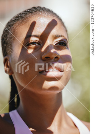 Shadow, fitness and hand of black woman for safety from sun during cardio training in city of New Zealand. Face of an African runner thinking of motivation for run, exercise and workout with cover 123704639