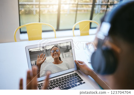 Laptop, virtual study meeting and students working on a university project together online. Elearning, collaboration and people greeting on a video call for academic work and discussion on a computer 123704704