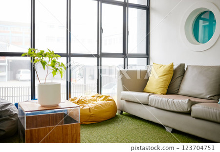 Room, interior and furniture with an empty space in a modern home or office during summer. Business, home and sofa in a luxury apartment for design, architecture or simplicity with a large window Room, interior and furniture with an empty space in a modern home or office during summer. Business, home and sofa in a luxury apartment for design, architecture or simplicity with a large window 123704751