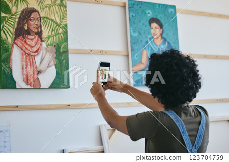 Art gallery, smartphone and black woman with painting taking photo for social media, website or digital advertising. African artist portrait design canvas, cellphone photography for commercial sales Art gallery, smartphone and black woman with painting taking photo for social media, website or digital advertising. African artist portrait design canvas, cellphone photography for commercial sales 123704759