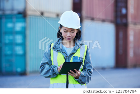 Shipping, container and logistics management by woman on digital tablet stock and cargo checklist supply chain. Factory, industry and delivery by asian woman check warehouse ecommerce online order Shipping, container and logistics management by woman on digital tablet stock and cargo checklist supply chain. Factory, industry and delivery by asian woman check warehouse ecommerce online order 123704794