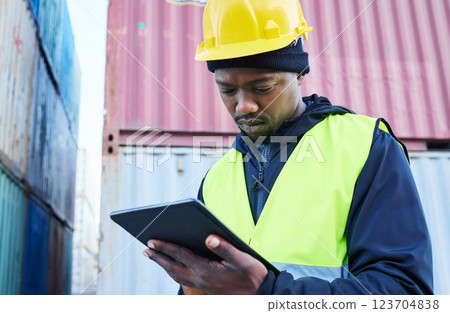 Digital tablet, logistics and black manager working on outdoor cargo freight site with shipping containers. African industrial man employee planning delivery, shipping and supply chain on mobile. 123704838