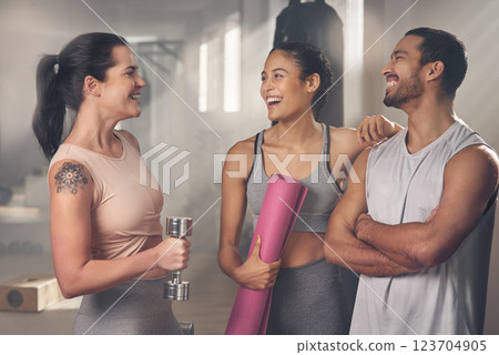 Laugh, fitness and group of friends at gym for sports joke, health or bodybuilder with exercise mat. Talking, team and people at club for workout, dumbbell training or funny conversation with coach Laugh, fitness and group of friends at gym for sports joke, health or bodybuilder with exercise mat. Talking, team and people at club for workout, dumbbell training or funny conversation with coach 123704905