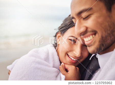 Wedding, hug and couple with care by beach for commitment, love or bonding together. Sea, travel and portrait of groom with bride for embrace at romantic, tropical or destination marriage by ocean. 123705002