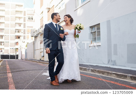 Love, wedding and couple in city walking for marriage, ceremony and commitment. Happy, partnership and man and woman with bouquet in street for relationship, promise and celebration for romance Love, wedding and couple in city walking for marriage, ceremony and commitment. Happy, partnership and man and woman with bouquet in street for relationship, promise and celebration for romance 123705009