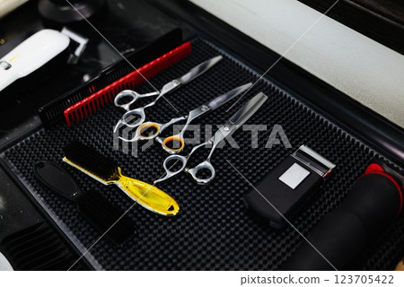 Tools for hair styling in a modern barbershop setting 123705422