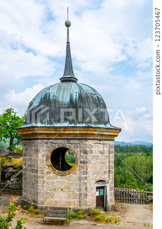 Exploring the historical castle ruins of Sloup v Cechach in Czechia reveals remnants of stone architecture under a dramatic sky. The site offers panoramic views of the surrounding landscape. 123705467