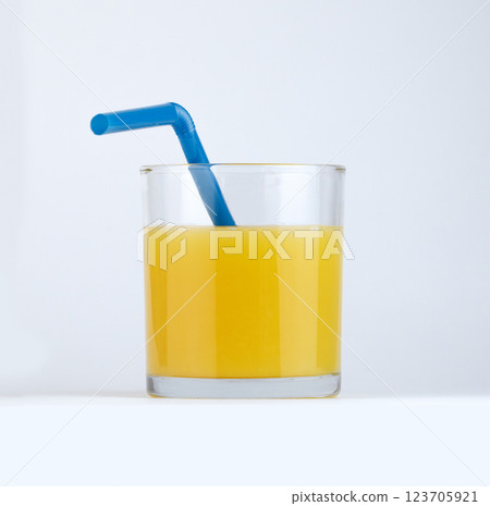 Freshly squeezed orange juice in a clear glass. High quality photo 123705921