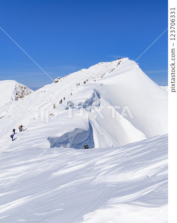 Oki no Mimi and huge snow cornice on the summit of Mt. Tanigawa (snowy mountain) 123706331