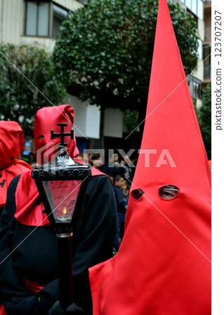 Holy week religious procession in Spain featuring traditional costumes Holy week religious procession in Spain featuring traditional costumes 123707207