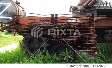 Rusty and burned-out armored vehicles on ukrainian territory. Exhibition of destroyed military equipment of the russian army. War between Ukraine and russia. Close up Slow motion 123707260