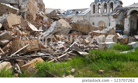 View to destroyed church at Kharkivska oblast. Ruined building after bomb attacks on ukrainian territory from russia army. Consequences of russian invasion of Ukraine. Slow motion 123707262