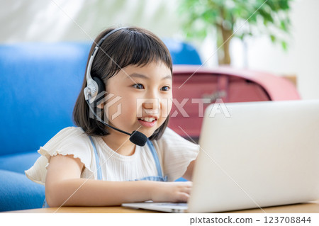 Girls taking classes online Girls taking classes online 123708844